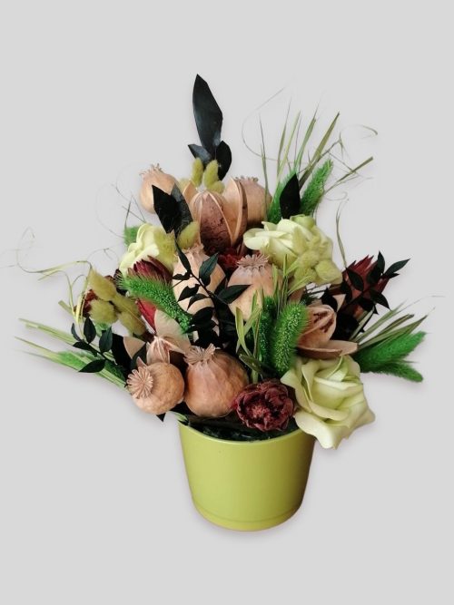 Mákgubós asztaldísz a zöld árnyalataiban